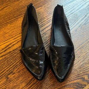 Aldo slip on black patent pebbled leather pointed toe flats. Size 7. New.